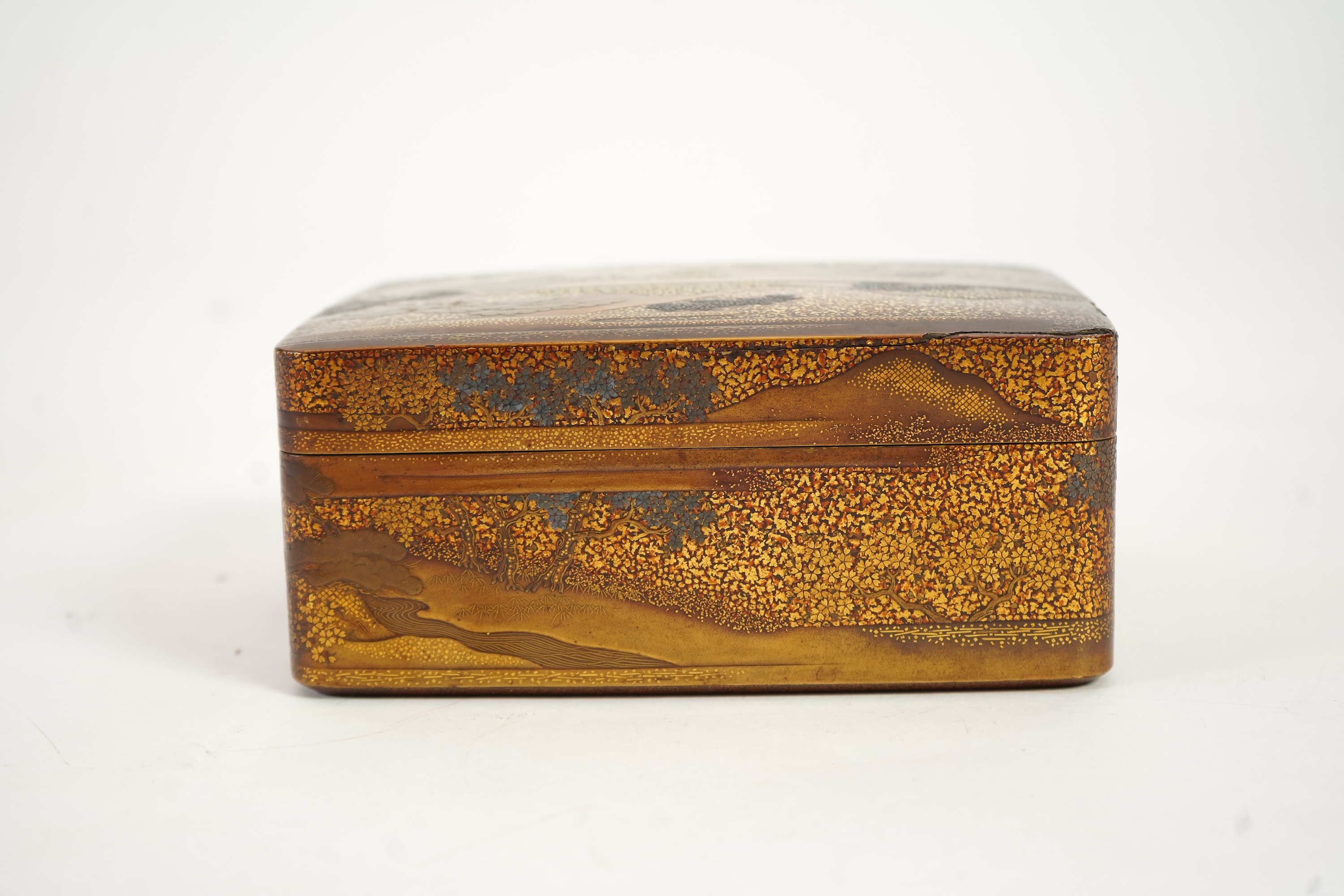 A Japanese gold lacquer ‘landscape’ box, tray and cover, 19th century